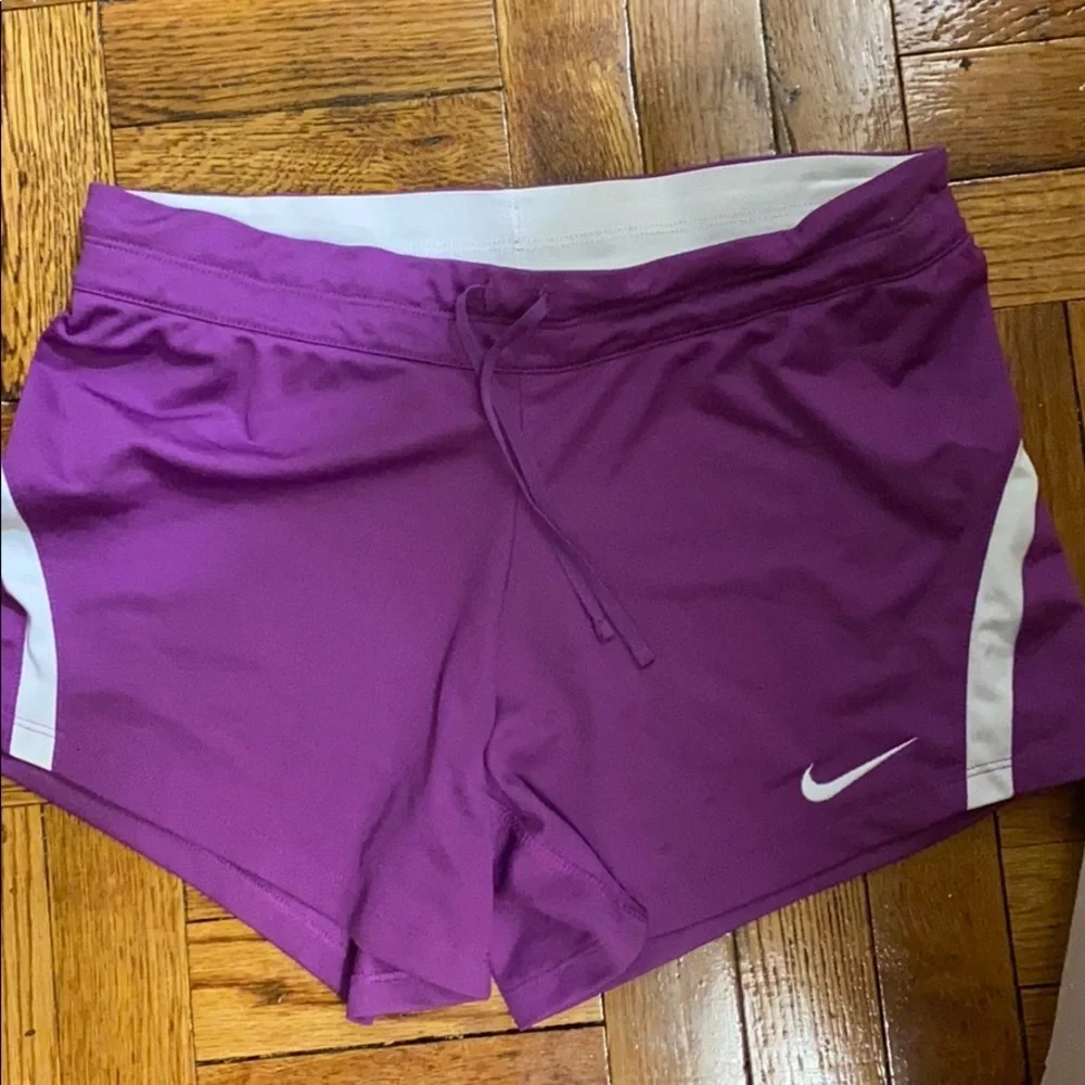 Nike purple dri-fit shorts with small pocket